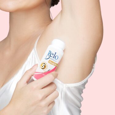 Lady showing her white underarm applying Belo Essentials Beauty Deo Whitening Anti- Perspirant Deodorant Filipino Beauty Products NZ