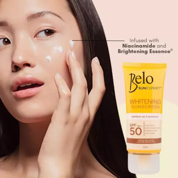 A lady applying Belo SunExpert Whitening Sunscreen SPF50 50mL; Whitens as it protects | Filipino Beauty Products NZ