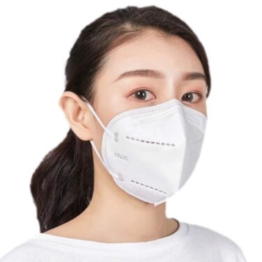 A lady wearing a white KN95 Disposable Protective Masks | Filipino Beauty Products NZ